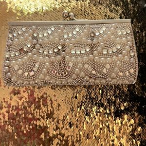 Pearls and rhinestone clutch purse.